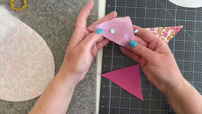 Assemble wings: Sew the solid and print wing pieces together, leaving the straight edge open. Turn right-side out and press.