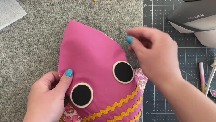 Finish stuffing: Fully stuff the owl.