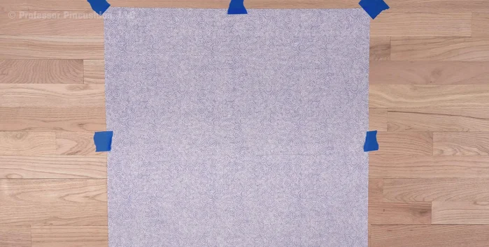 Optionally, spray the backing with basting spray for better adhesion.