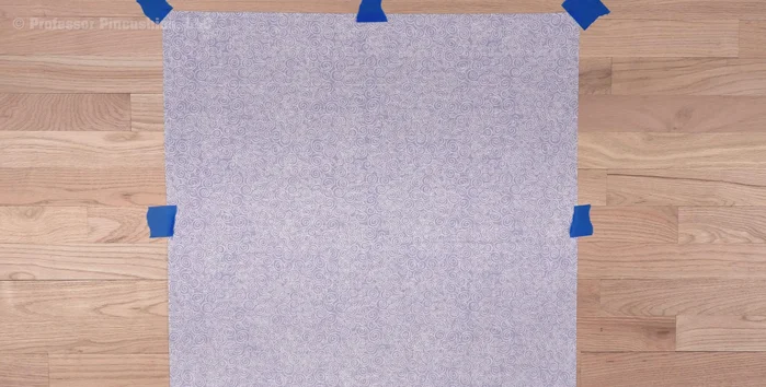 Optionally, spray the backing with basting spray for better adhesion.