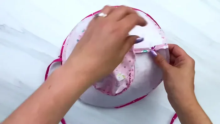 Sew around the brim, leaving a small opening to turn right side out.