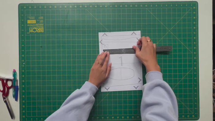 Cut out the sewing pattern, overlapping pages to create a continuous pattern.