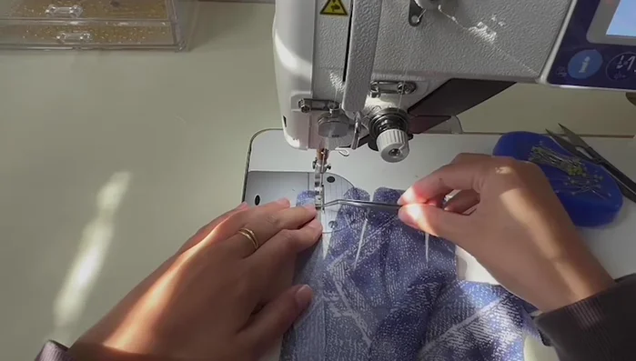 Finish sewing and trim excess fabric from the fingers to create a neat, triangular shape.