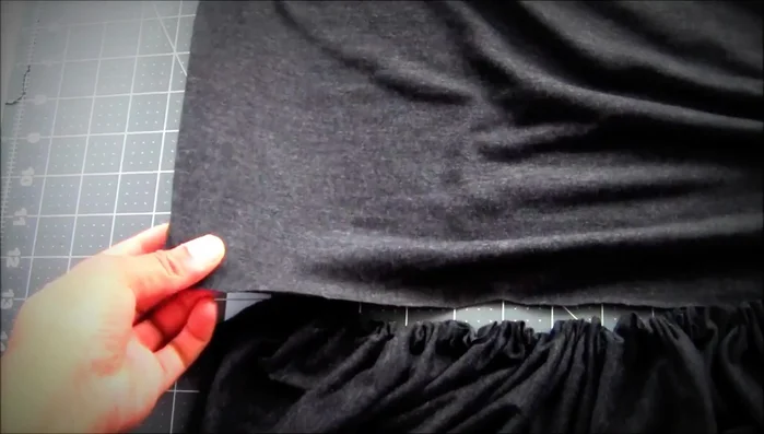 Pin and sew the gathered skirt panels to the bodice.