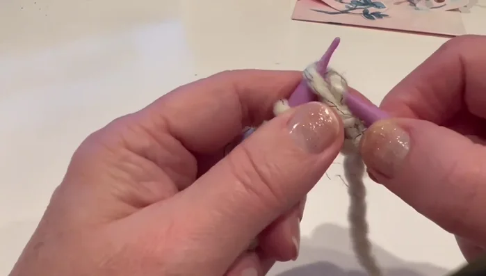 Repeat step 2 until the scarf reaches approximately 25 inches folded (or 50 inches unfolded).