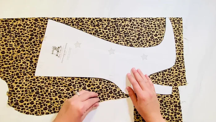 Get your boot stocking piece and place it on your folded fabric (wrong sides together). Cut out two mirrored pieces.