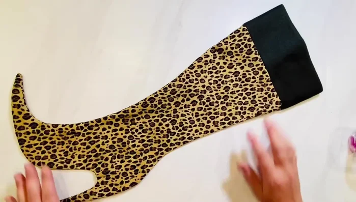 Fold the cuff up or down as desired, hiding the seam.