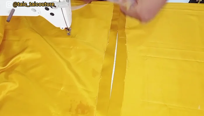 Finish the neckline. Fold the neckline edge over by 1/2 inch and stitch, or use bias tape/fusible interfacing.