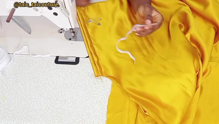Insert elastic into the sleeve casings and stitch closed. The elastic should be 1 inch shorter than your elbow measurement.