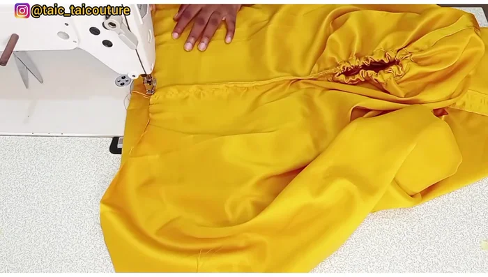 Insert elastic (1 inch shorter than your waist measurement) into the bottom casing, stitch closed, and close the 2-inch opening.