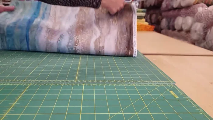 Cut the fabric into strips according to the pattern (3", 2.5", 2", 1.5", 2", repeating).