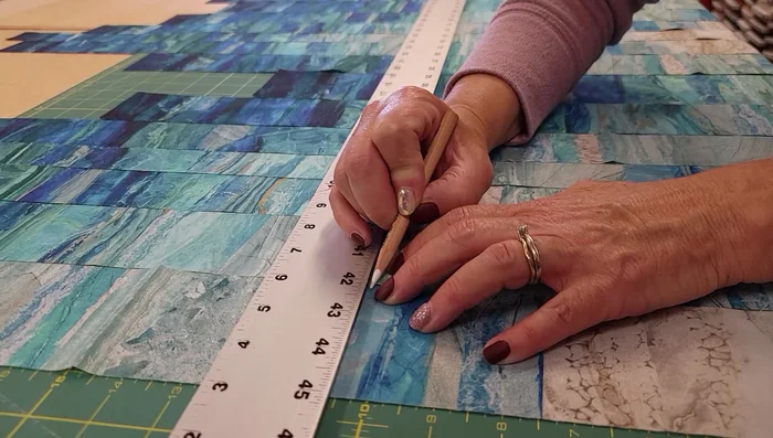 Mark the edges of the strips with chalk pencil for seam allowance (1/4" or less).