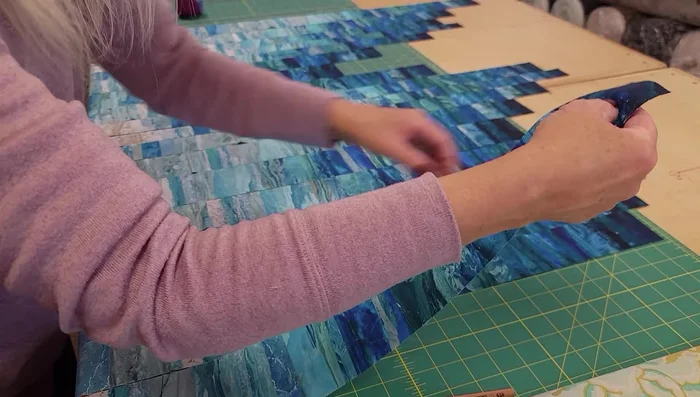 Finger press each seam allowance to the same direction.