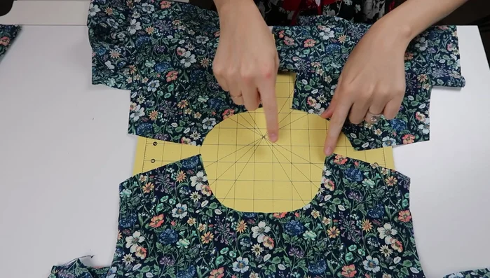 Pin and stitch shoulder seams, pressing seam open.