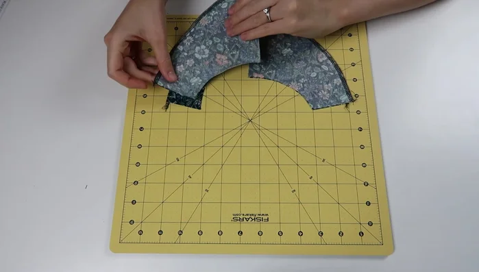 Insert loop into keyhole opening, pin and stitch closed.