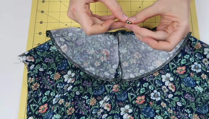 Insert loop into keyhole opening, pin and stitch closed.