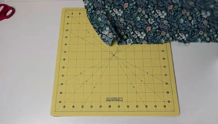 Stitch side seams, finishing seam allowances with serger.