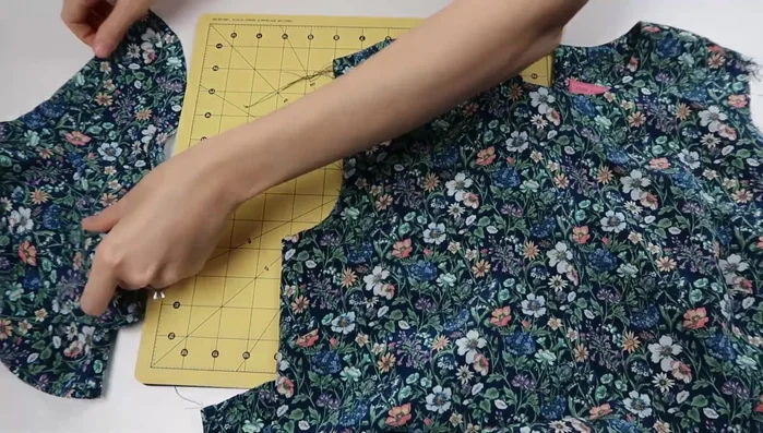 Set sleeves into armholes.