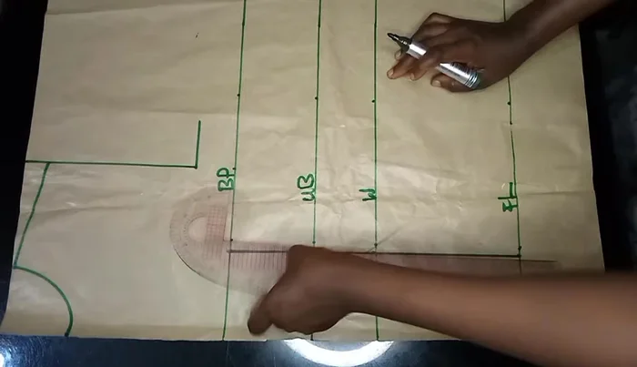 Shape the bust dart by curving down approximately 4 inches from the bust point using a curve ruler.