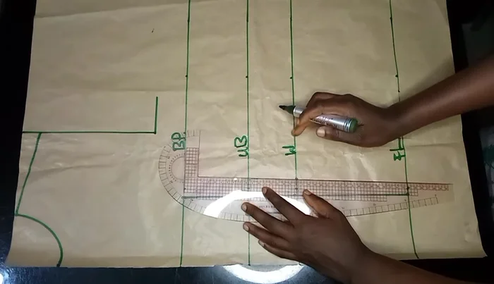 Shape the bust dart by curving down approximately 4 inches from the bust point using a curve ruler.