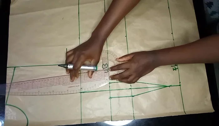 Shape the bust dart by curving down approximately 4 inches from the bust point using a curve ruler.