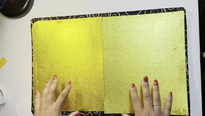 Final Fold and Glue: Fold the clutch into its final shape. Carefully decide where you want the fold to be, ensuring even distribution of fabric. Glue the seam and use binder clips to secure while drying.