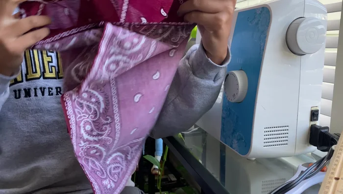 Stuff the bottom two sections of the bag, using the marked lines as guides.