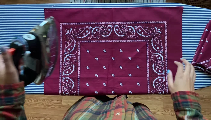 Cut four bandanas to desired bag size. (Optional: You can sew without cutting.)