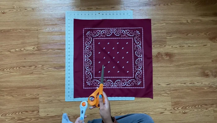 Cut four bandanas to desired bag size. (Optional: You can sew without cutting.)