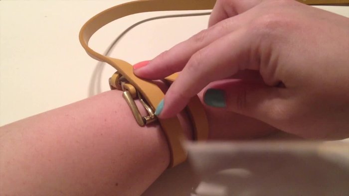 Measure a couple of inches from the mark and cut the belt.