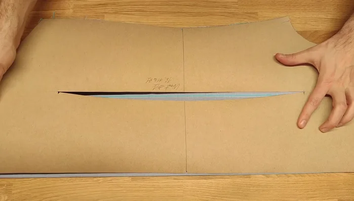 Transfer the dart length from your initial shirt pattern or divide the dart's new length in half to find the middle.