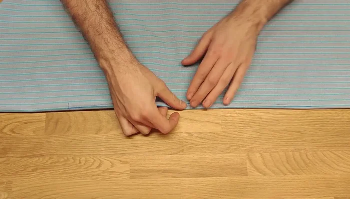 Secure both sides of the dart with pins. Ensure all stripes remain parallel. 