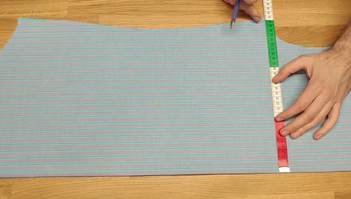 Transfer the dart length from your initial shirt pattern or divide the dart's new length in half to find the middle.