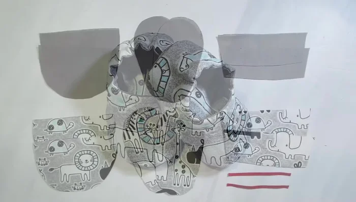 Print and cut out pattern pieces from fabric (four of each: two outer, two lining).