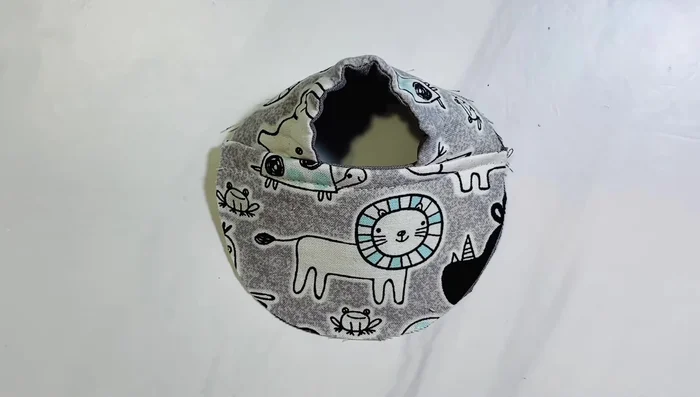 Attach soles: Make a small slit in the front of the top piece and the sole. Match slits, pin/clip together. Repeat for the back. Pin/clip the sole around the top piece's edge.