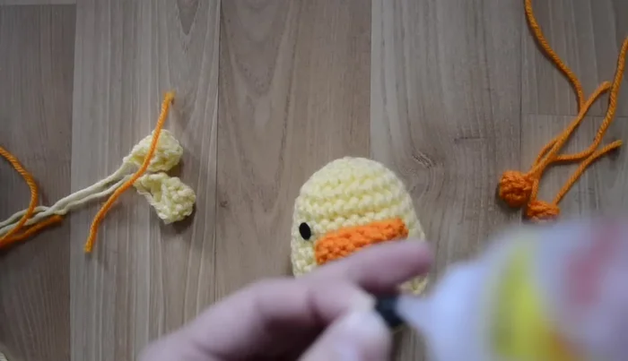 Attach eyes (felt circles suggested).