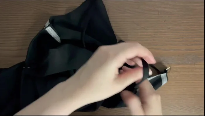 Pin straps to the front and back right sides together; check the strap length. Place the facing and the dress right sides together, align the edges, pin, and sew.