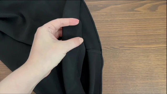 Finish the hem the same way as the facing's hem.