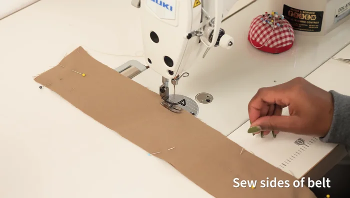Edge stitch the belt: Sew an edge stitch around the edges of the belt to keep it flat and create a professional look.