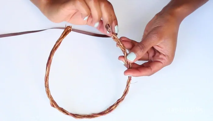 Secure the headband with ribbon and hot glue.