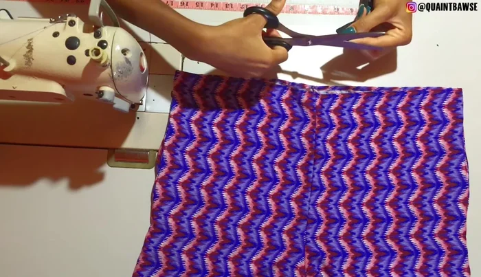 Cut a notch at the top and bottom of the elastic on both sides.