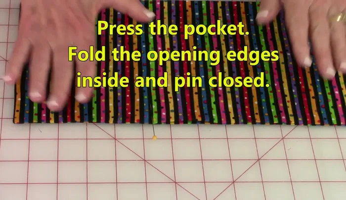 Pin the opening closed and stitch close to the edge to secure it.