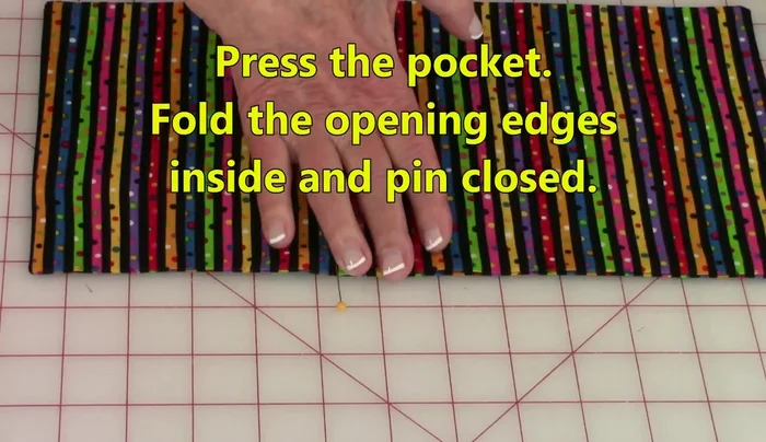 Pin the opening closed and stitch close to the edge to secure it.