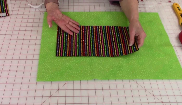 Optional: For added strength, especially with heavy items, place interfacing over the pocket before stitching.