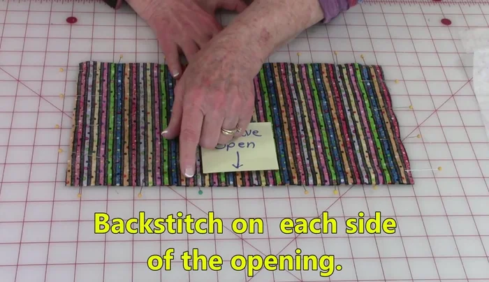 Trim the corners to about 1/8 inch to reduce bulk.