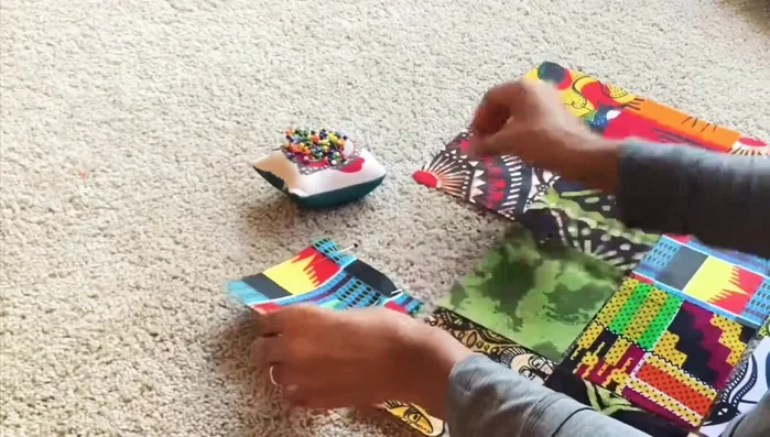 Iron seams toward the first square of each row.