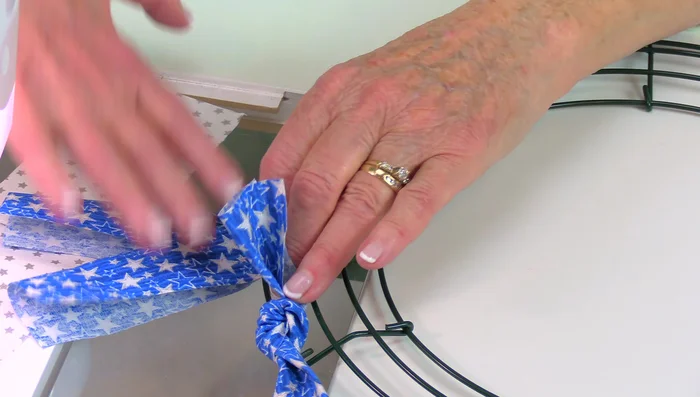 Continue Attaching: Repeat the process, creating a pattern or design by alternating colors and adjusting the number of strips per row. Work your way from the outer ring to the center.