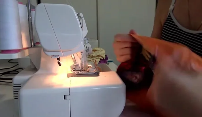 Overlock top edge: Overlock the top edge.