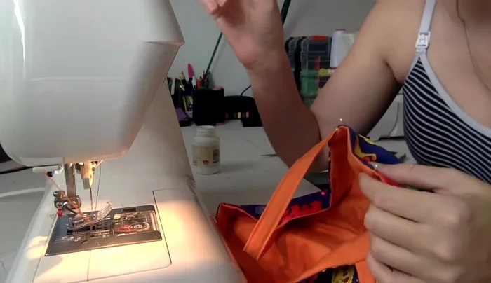 Top stitch the bag top: Top stitch around the top edge of the bag to finish.