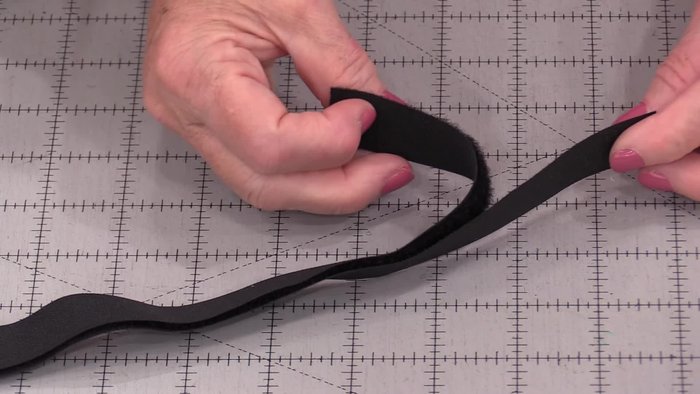 Prepare the Velcro: Identify the rough side of the Velcro. The rough side has loops that can catch the thread.